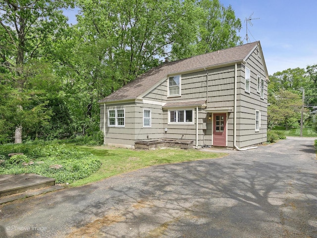 1325 Gilbert Ave, Downers Grove, IL 60515 - view of front of home with roof with shingles and a front lawn