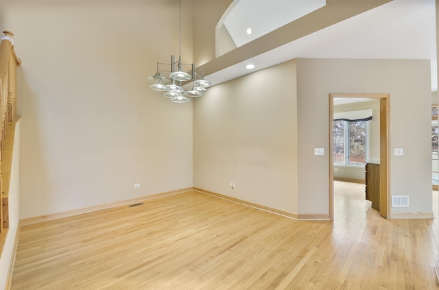 4517 S Seminole Dr, Glenview, IL 60026 - unfurnished room featuring visible vents, light wood-type flooring, baseboards, an inviting chandelier, and recessed lighting