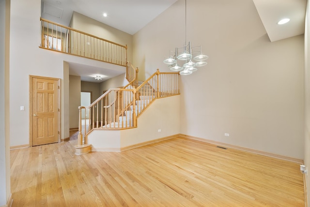 4517 S Seminole Dr, Glenview, IL 60026 - interior space featuring stairway, baseboards, wood finished floors, and a towering ceiling