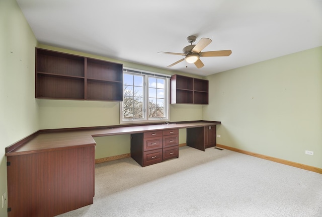 4517 S Seminole Dr, Glenview, IL 60026 - unfurnished office with a ceiling fan, baseboards, light carpet, and built in study area