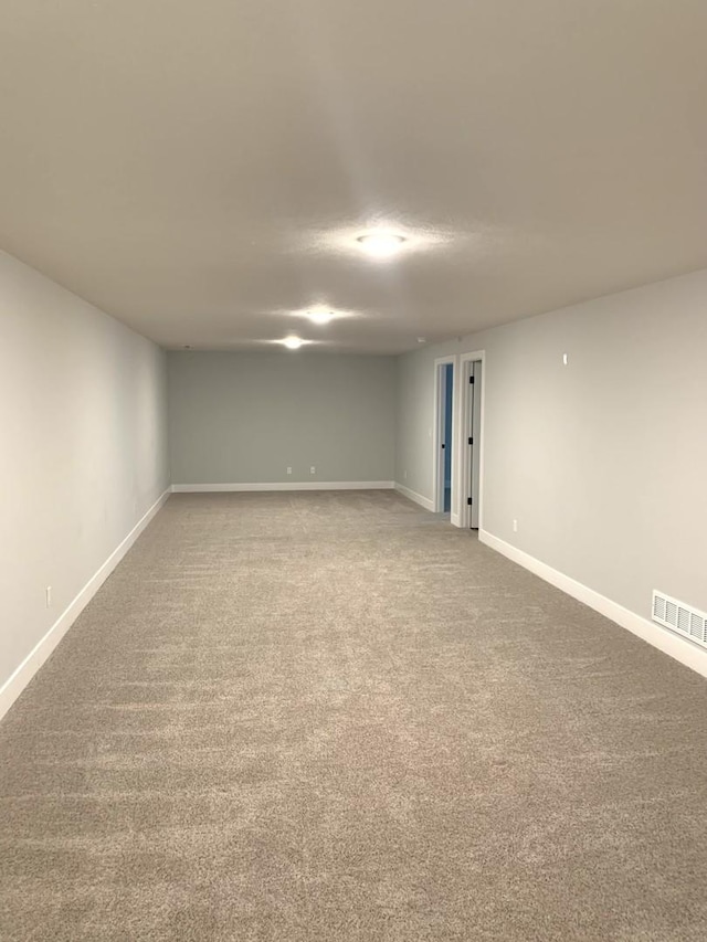 1805 Glenbridge Rd, Bloomington, IL 61704 - carpeted empty room featuring baseboards and visible vents