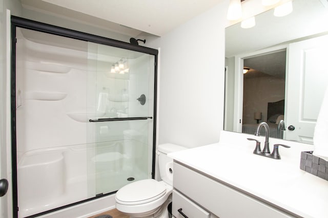 1805 Glenbridge Rd, Bloomington, IL 61704 - bathroom featuring a shower stall, toilet, and vanity