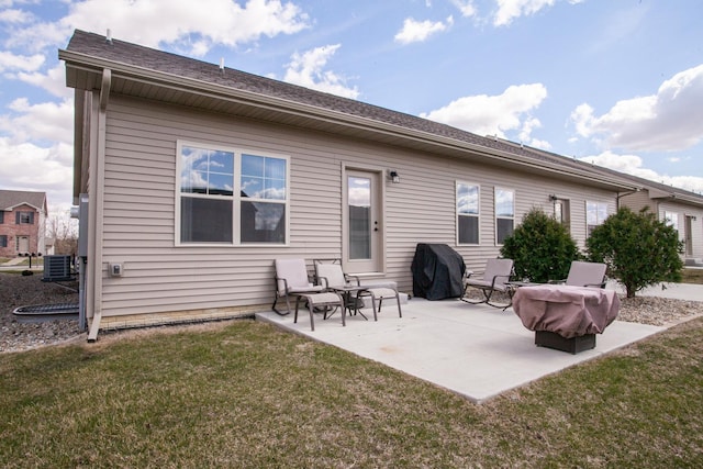1805 Glenbridge Rd, Bloomington, IL 61704 - rear view of property with a lawn, central air condition unit, and a patio area