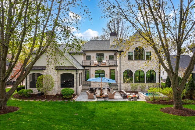 1017 Royal Bombay Ct, Naperville, IL 60563 - rear view of property featuring a balcony, a yard, a patio area, and an outdoor hangout area