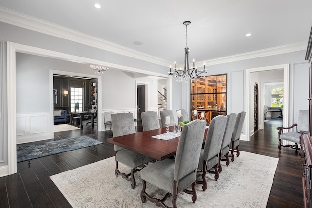 1017 Royal Bombay Ct, Naperville, IL 60563 - dining space with ornamental molding, a notable chandelier, wainscoting, and stairway