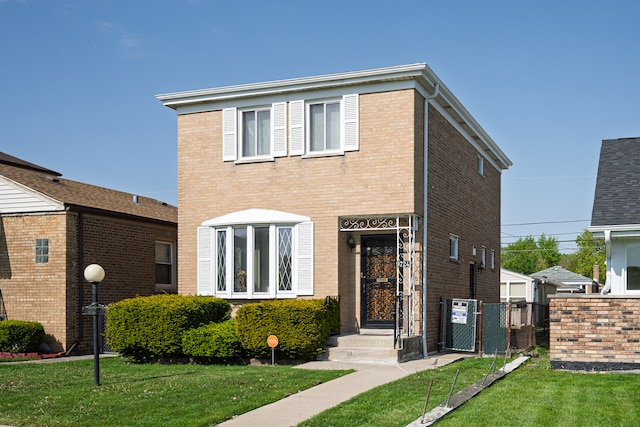 9724 S Princeton Ave, Chicago, IL 60628 - traditional home with brick siding and a gate