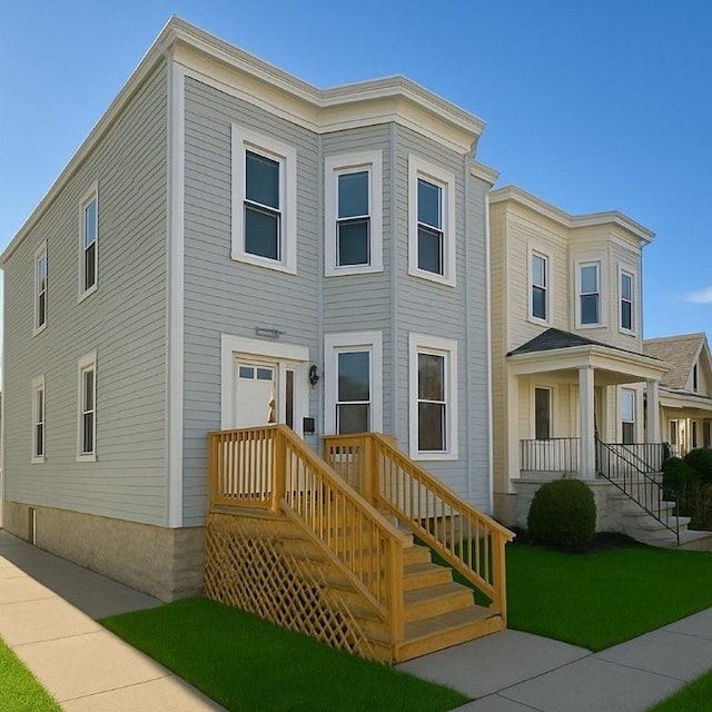 view of front facade with a front yard