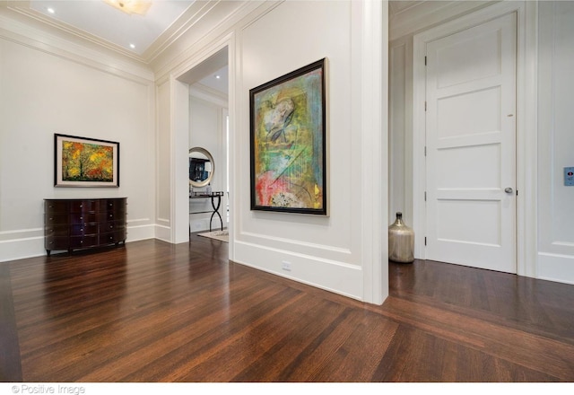1853 N Burling St, Chicago, IL 60614 - unfurnished living room featuring crown molding, wood finished floors, and baseboards