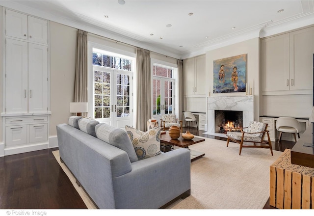 1853 N Burling St, Chicago, IL 60614 - living room featuring crown molding, dark wood finished floors, a fireplace, and french doors