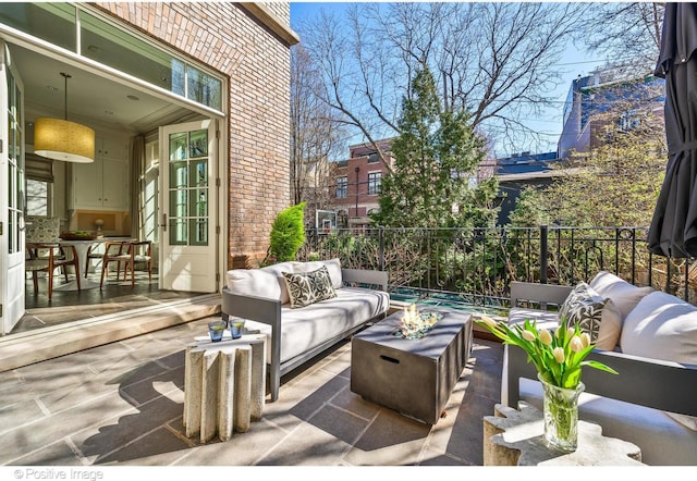 1853 N Burling St, Chicago, IL 60614 - view of patio with an outdoor living space with a fire pit