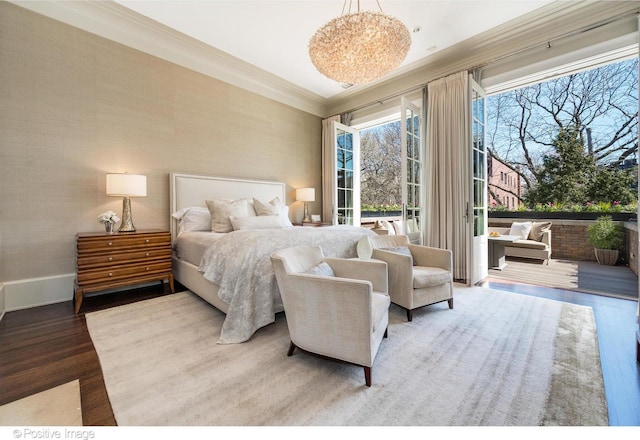 1853 N Burling St, Chicago, IL 60614 - bedroom featuring wood finished floors, access to outside, and crown molding
