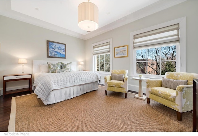 1853 N Burling St, Chicago, IL 60614 - bedroom with crown molding, wood finished floors, and baseboards