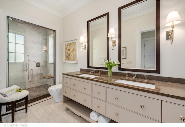 1853 N Burling St, Chicago, IL 60614 - full bath featuring ornamental molding, a shower stall, double vanity, toilet, and tile patterned flooring