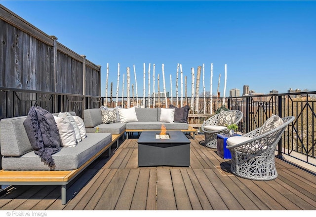 1853 N Burling St, Chicago, IL 60614 - wooden deck with an outdoor living space with a fire pit