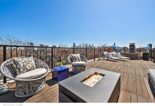 1853 N Burling St, Chicago, IL 60614 - wooden terrace featuring an outdoor living space with a fire pit