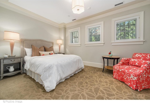 1853 N Burling St, Chicago, IL 60614 - bedroom featuring crown molding, multiple windows, baseboards, and carpet flooring