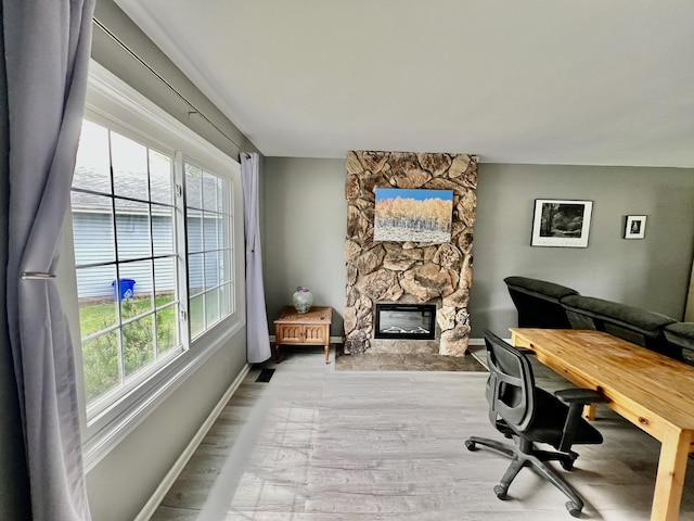 2S605 Continental Dr, Warrenville, IL 60555 - office area with baseboards, visible vents, wood finished floors, and a fireplace