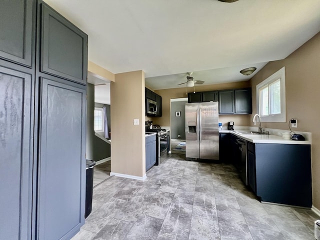 2S605 Continental Dr, Warrenville, IL 60555 - kitchen featuring light countertops, ceiling fan, stainless steel appliances, and a sink