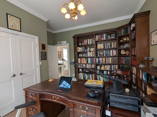 home office with an inviting chandelier and ornamental molding