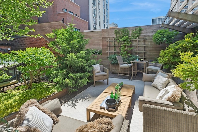 view of patio featuring a pergola and outdoor lounge area