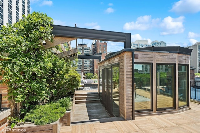 wooden terrace with a city view