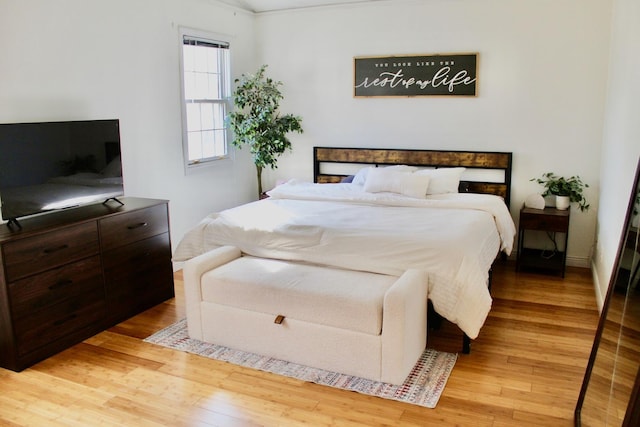 bedroom with light wood-type flooring