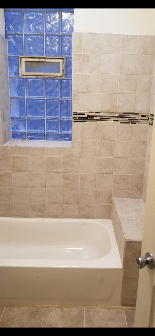 bathroom featuring tile patterned flooring