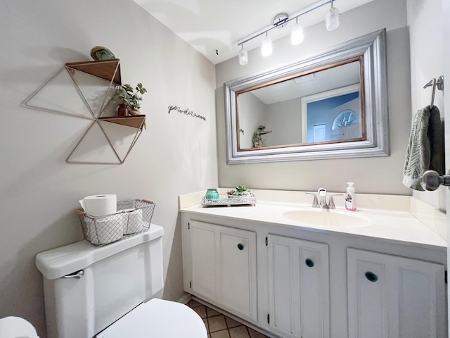 650 Cress Creek Ln, Crystal Lake, IL 60014 - half bathroom featuring toilet, vanity, and tile patterned flooring