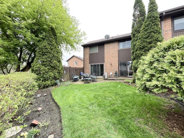 650 Cress Creek Ln, Crystal Lake, IL 60014 - rear view of property featuring brick siding and a patio area