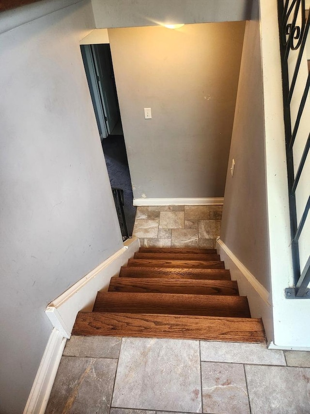 17109 Magnolia Dr, Hazel Crest, IL 60429 - staircase with stone tile floors and baseboards