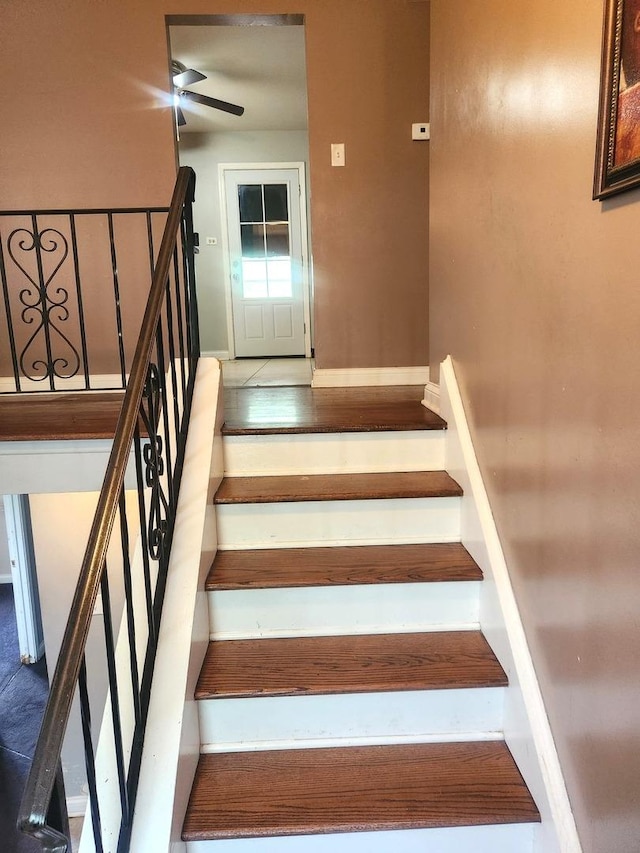 17109 Magnolia Dr, Hazel Crest, IL 60429 - stairway with baseboards and a ceiling fan
