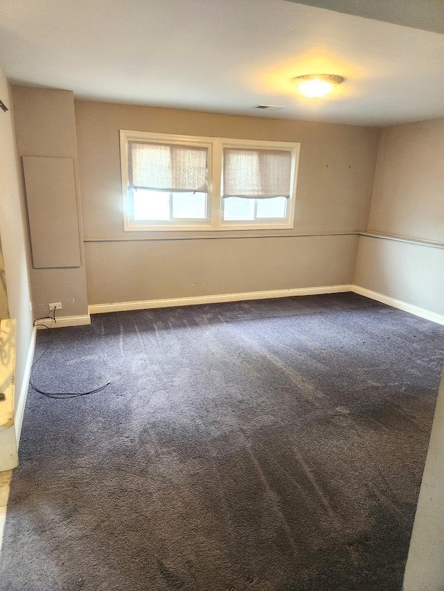 17109 Magnolia Dr, Hazel Crest, IL 60429 - carpeted spare room featuring baseboards and plenty of natural light