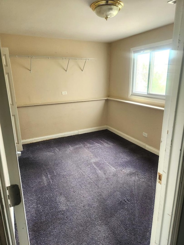 17109 Magnolia Dr, Hazel Crest, IL 60429 - unfurnished room with dark carpet and baseboards