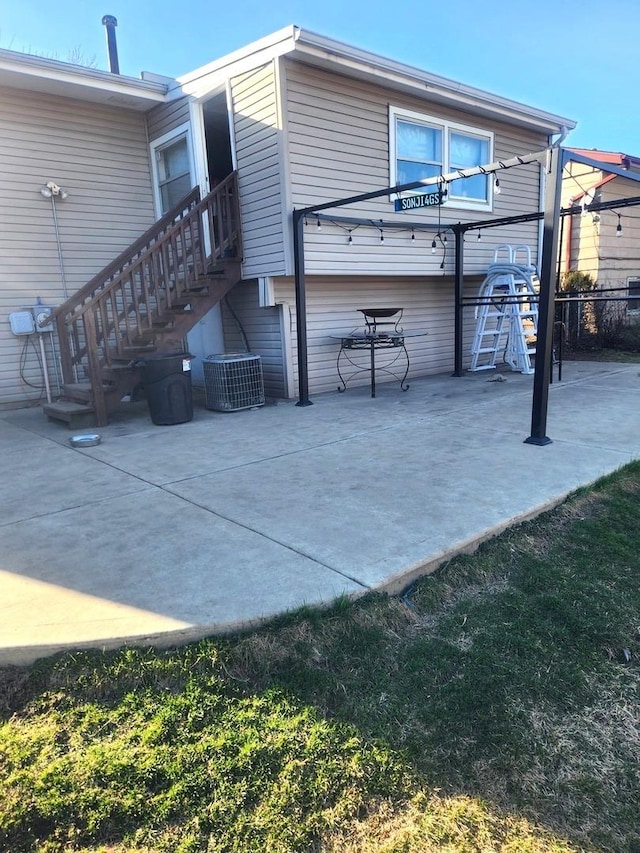 17109 Magnolia Dr, Hazel Crest, IL 60429 - rear view of house with a patio and stairway