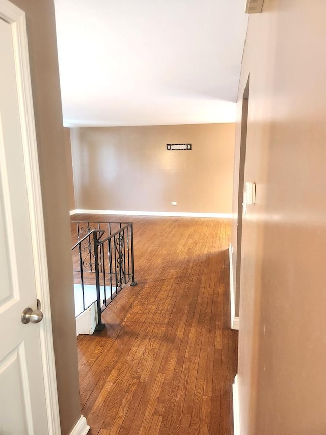 17109 Magnolia Dr, Hazel Crest, IL 60429 - hall with hardwood / wood-style floors, an upstairs landing, and baseboards