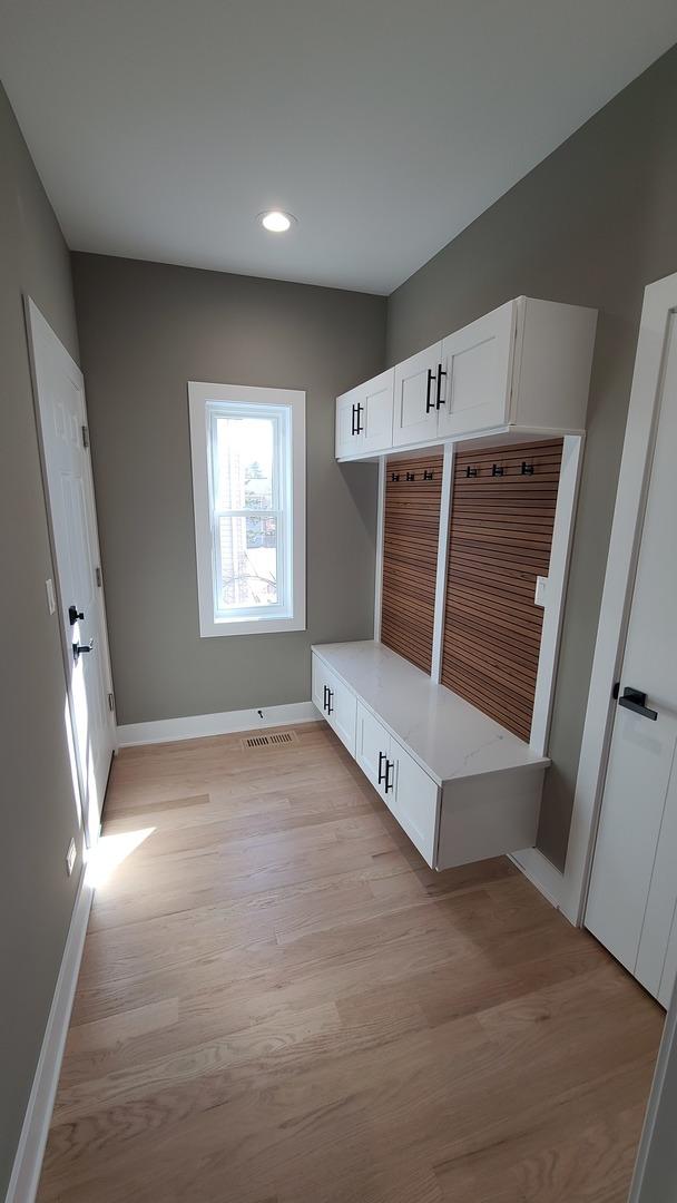 mudroom featuring baseboards, visible vents, recessed lighting, and light wood-type flooring