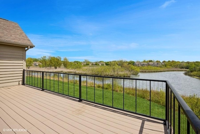 wooden terrace with a water view