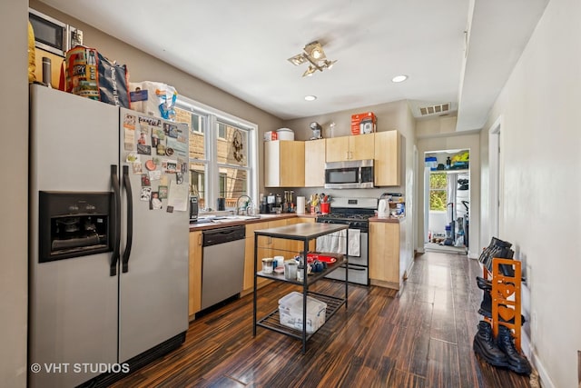 1943 N Whipple St, Chicago, IL 60647 - kitchen with appliances with stainless steel finishes, light brown cabinets, dark wood-style flooring, and recessed lighting