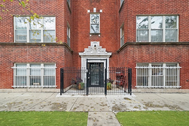 4700 N Monticello Ave Unit 102, Chicago, IL 60625 - exterior space with brick siding, a gate, and fence
