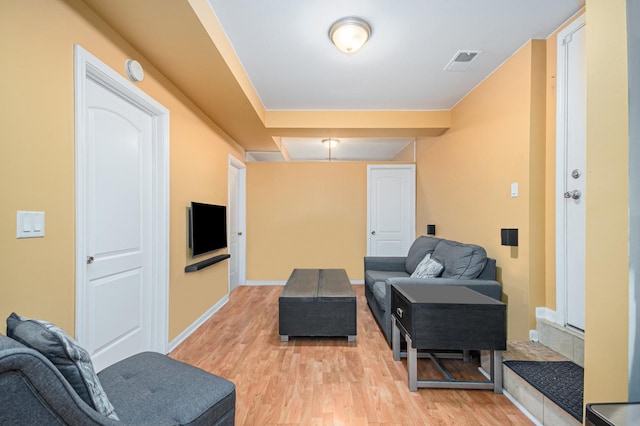 4700 N Monticello Ave Unit 102, Chicago, IL 60625 - living area featuring baseboards, visible vents, and light wood-style flooring