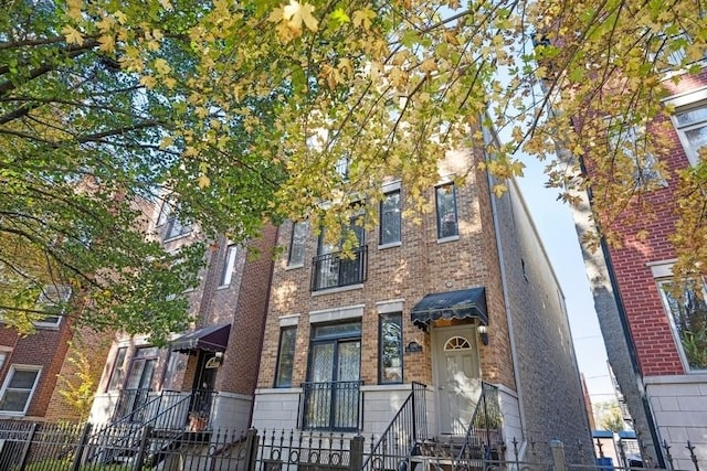 1540 E 65th Pl Unit 3, Chicago, IL 60637 - view of front of property with brick siding and fence