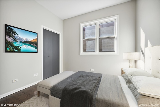 1540 E 65th Pl Unit 3, Chicago, IL 60637 - bedroom featuring baseboards and wood finished floors