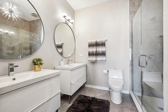 1540 E 65th Pl Unit 3, Chicago, IL 60637 - full bath with toilet, a sink, two vanities, a shower stall, and baseboards