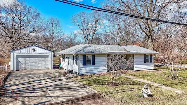 161 S Cash St, Seneca, IL 61360 - ranch-style home with an outbuilding, a detached garage, a front yard, a shingled roof, and a chimney
