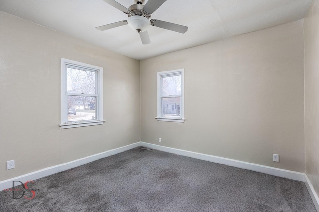161 S Cash St, Seneca, IL 61360 - spare room with baseboards, carpet floors, and ceiling fan
