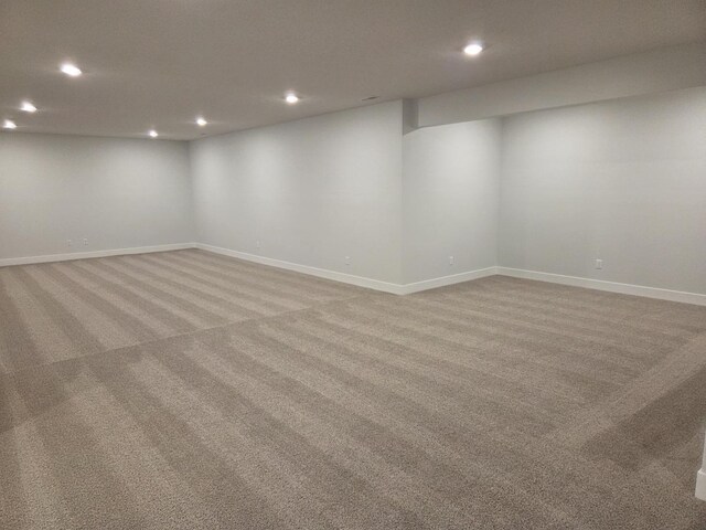 2477 Stanfield Ln, Normal, IL 61761 - finished below grade area featuring baseboards, light carpet, and recessed lighting