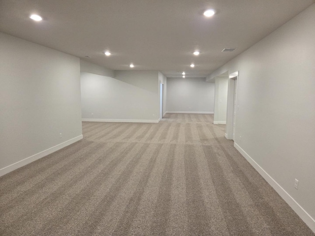 2477 Stanfield Ln, Normal, IL 61761 - finished below grade area featuring baseboards, recessed lighting, and light colored carpet