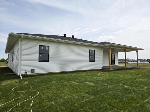 2477 Stanfield Ln, Normal, IL 61761 - rear view of property featuring a lawn