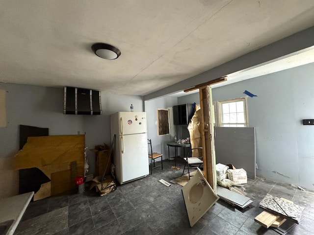 interior space featuring freestanding refrigerator