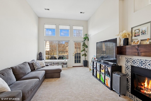 639 Concord Way, Prospect Heights, IL 60070 - carpeted living room featuring a fireplace and visible vents